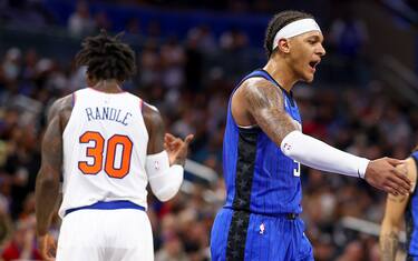 ORLANDO, FLORIDA - MARCH 23: Paolo Banchero #5 and Wendell Carter Jr. #34 of the Orlando Magic react against the New York Knicks during the third quarter at Amway Center on March 23, 2023 in Orlando, Florida. NOTE TO USER: User expressly acknowledges and agrees that, by downloading and or using this photograph, User is consenting to the terms and conditions of the Getty Images License Agreement. (Photo by Douglas P. DeFelice/Getty Images)