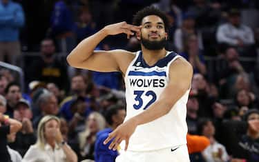 SAN FRANCISCO, CALIFORNIA - MARCH 26: Karl-Anthony Towns #32 of the Minnesota Timberwolves reacts after he made the game-winning shot against the Golden State Warriors at Chase Center on March 26, 2023 in San Francisco, California. NOTE TO USER: User expressly acknowledges and agrees that, by downloading and or using this photograph, User is consenting to the terms and conditions of the Getty Images License Agreement.  (Photo by Ezra Shaw/Getty Images)