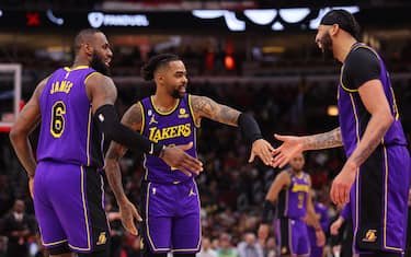 CHICAGO, ILLINOIS - MARCH 29: LeBron James #6, D'Angelo Russell #1 and Anthony Davis #3 of the Los Angeles Lakers celebrate against the Chicago Bulls during the second half at United Center on March 29, 2023 in Chicago, Illinois. NOTE TO USER: User expressly acknowledges and agrees that, by downloading and or using this photograph, User is consenting to the terms and conditions of the Getty Images License Agreement. (Photo by Michael Reaves/Getty Images)