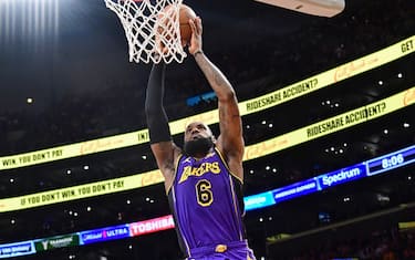 LOS ANGELES, CA - APRIL 7:  LeBron James #6 of the Los Angeles Lakers goes to the basket during the game on April 7, 2023 at Crypto.Com Arena in Los Angeles, California. NOTE TO USER: User expressly acknowledges and agrees that, by downloading and/or using this Photograph, user is consenting to the terms and conditions of the Getty Images License Agreement. Mandatory Copyright Notice: Copyright 2023 NBAE (Photo by Adam Pantozzi/NBAE via Getty Images)