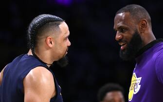 LOS ANGELES, CALIFORNIA - APRIL 22: LeBron James #6 of the Los Angeles Lakers talks with Dillon Brooks #24 of the Memphis Grizzlies before Game Three of the Western Conference First Round Playoffs at Crypto.com Arena on April 22, 2023 in Los Angeles, California. NOTE TO USER: User expressly acknowledges and agrees that, by downloading and or using this photograph, User is consenting to the terms and conditions of the Getty Images License Agreement. (Photo by Harry How/Getty Images)
