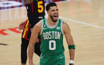 ATLANTA, GEORGIA - APRIL 23:  Jayson Tatum #0 of the Boston Celtics reacts after hitting a three-point basket against the Atlanta Hawks during the fourth quarter of Game Four of the Eastern Conference First Round Playoffs at State Farm Arena on April 23, 2023 in Atlanta, Georgia. NOTE TO USER: User expressly acknowledges and agrees that, by downloading and or using this photograph, User is consenting to the terms and conditions of the Getty Images License Agreement.  (Photo by Kevin C. Cox/Getty Images)
