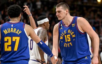 DENVER, CO - APRIL 29: Nikola Jokic (15) of the Denver Nuggets gets hyped after Jamal Murray (27) drew a hard foul from Chris Paul (3) of the Phoenix Suns during the fourth quarter of Denvers 125-107 win at Ball Arena in Denver on Saturday, April 29, 2023. Denver took a 1-0 series lead in the best-of-seven Western Conference semifinal matchup. (Photo by AAron Ontiveroz/MediaNews Group/The Denver Post via Getty Images)