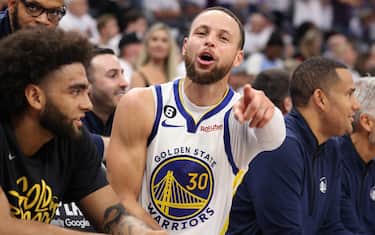 SACRAMENTO, CALIFORNIA - APRIL 30: Stephen Curry #30 of the Golden State Warriors reacts on the bench during the fourth quarter in game seven of the Western Conference First Round Playoffs against the Sacramento Kings at Golden 1 Center on April 30, 2023 in Sacramento, California. NOTE TO USER: User expressly acknowledges and agrees that, by downloading and or using this photograph, User is consenting to the terms and conditions of the Getty Images License Agreement. (Photo by Ezra Shaw/Getty Images)