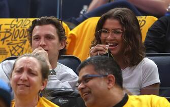 SAN FRANCISCO, CA - May 4: Tom Holland and Zendaya takes in the game between the Los Angeles Lakers and Golden State Warriors during Game 2 of the 2023 NBA Playoffs Western Conference Semifinals on May 4, 2023 at Chase Center in San Francisco, California. NOTE TO USER: User expressly acknowledges and agrees that, by downloading and/or using this Photograph, user is consenting to the terms and conditions of the Getty Images License Agreement. Mandatory Copyright Notice: Copyright 2023 NBAE (Photo by Jim Poorten/NBAE via Getty Images)