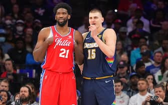 PHILADELPHIA, PA - MARCH 14: Joel Embiid #21 of the Philadelphia 76ers talks to Nikola Jokic #15 of the Denver Nuggets at the Wells Fargo Center on March 14, 2022 in Philadelphia, Pennsylvania. The Nuggets defeated the 76ers 114-110. NOTE TO USER: User expressly acknowledges and agrees that, by downloading and or using this photograph, User is consenting to the terms and conditions of the Getty Images License Agreement. (Photo by Mitchell Leff/Getty Images)
