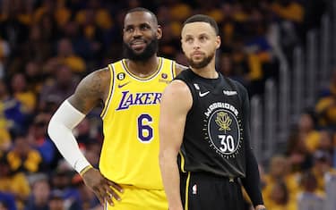 SAN FRANCISCO, CALIFORNIA - MAY 02: LeBron James #6 of the Los Angeles Lakers stands next to Stephen Curry #30 of the Golden State Warriors during the second quarter in game one of the Western Conference Semifinal Playoffs at Chase Center on May 02, 2023 in San Francisco, California. NOTE TO USER: User expressly acknowledges and agrees that, by downloading and or using this photograph, User is consenting to the terms and conditions of the Getty Images License Agreement. (Photo by Ezra Shaw/Getty Images)