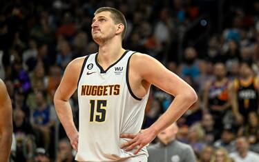PHOENIX, AZ - MAY 7: Nikola Jokic (15) of the Denver Nuggets reacts to the Nuggets' inability to catch the Phoenix Suns during the fourth quarter of Phoenix's series-tying 129-124 win at Footprint Center in Phoenix on Sunday, May 7, 2023. The series, now knotted at 2-2, heads back to Denver for game five. (Photo by AAron Ontiveroz/The Denver Post)