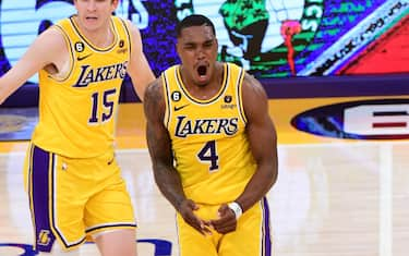 LOS ANGELES, CA - MAY 8: Lonnie Walker IV #4 of the Los Angeles Lakers celebrates during Game Four of the Western Conference Semi-Finals of the 2023 NBA Playoffs against the Golden State Warriors on May 8, 2023 at Crypto.com Arena in Los Angeles, California. NOTE TO USER: User expressly acknowledges and agrees that, by downloading and/or using this Photograph, user is consenting to the terms and conditions of the Getty Images License Agreement. Mandatory Copyright Notice: Copyright 2023 NBAE (Photo by Adam Pantozzi/NBAE via Getty Images)