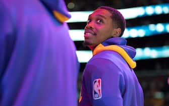 LOS ANGELES, CA - APRIL 7:  Lonnie Walker IV #4 of the Los Angeles Lakers looks on during the game on April 7, 2023 at Crypto.Com Arena in Los Angeles, California. NOTE TO USER: User expressly acknowledges and agrees that, by downloading and/or using this Photograph, user is consenting to the terms and conditions of the Getty Images License Agreement. Mandatory Copyright Notice: Copyright 2023 NBAE (Photo by Tyler Ross/NBAE via Getty Images)