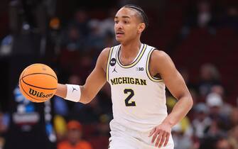 CHICAGO, ILLINOIS - MARCH 09: Kobe Bufkin #2 of the Michigan Wolverines dribbles against the Rutgers Scarlet Knights during the second round of the Big Ten Tournament at United Center on March 09, 2023 in Chicago, Illinois. (Photo by Michael Reaves/Getty Images)