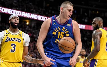 DENVER, CO - MAY 16: Nikola Jokic (15) of the Denver Nuggets flexes after posterizing Anthony Davis (3) of the Los Angeles Lakers during the second quarter at Ball Arena in Denver on Tuesday, May 16, 2023. (Photo by AAron Ontiveroz/The Denver Post)