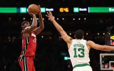 BOSTON, MASSACHUSETTS - MAY 17: Jimmy Butler #22 of the Miami Heat shoots over Malcolm Brogdon #13 of the Boston Celtics during the fourth quarter of game one of the Eastern Conference Finals at TD Garden on May 17, 2023 in Boston, Massachusetts. NOTE TO USER: User expressly acknowledges and agrees that, by downloading and or using this photograph, User is consenting to the terms and conditions of the Getty Images License Agreement. (Photo by Adam Glanzman/Getty Images)