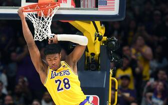 Denver, Colorado May 16, 2023-Lakers Rui Hachimura dunks over Nuggets Kentavious Caldwell-Pope in the second quarter in Game 2 of the Western Conference Finals in Denver Thursday. (Wally Skalij/Los Angeles Times via Getty Images)