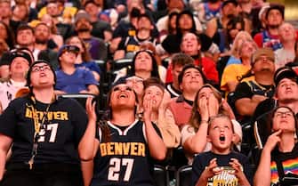 DENVER, COLORADO - MAY 22: Fans watch the big screens at Ball Arena show the Denver Nuggets playing in Game 4 of the Western Conference Finals on May 22, 2023 in Denver, Colorado. Denver Nuggets are playing Los Angeles Lakers in Los Angeles. If the Nuggets win they will clinch a spot in the NBA Finals for the first time in franchise history. (Photo by  RJ Sangosti/MediaNews Group/The Denver Post via Getty Images)
