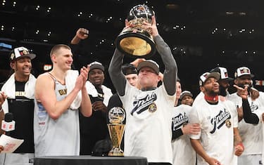 LOS ANGELES, CA - MAY 22: Head Coach Michael Malone of the Denver Nuggets displays the Oscar Robertson Western Conference trophy after Round 3 Game 4 of the Western Conference Finals 2023 NBA Playoffs against the Los Angeles Lakers on May 22, 2023 at Crypto.Com Arena in Los Angeles, California. NOTE TO USER: User expressly acknowledges and agrees that, by downloading and/or using this Photograph, user is consenting to the terms and conditions of the Getty Images License Agreement. Mandatory Copyright Notice: Copyright 2023 NBAE (Photo by Andrew D. Bernstein/NBAE via Getty Images)