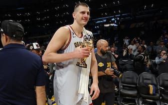 LOS ANGELES, CALIFORNIA - MAY 22: Nikola Jokic #15 of the Denver Nuggets celebrates with the Most Valuable Player trophy following the game four and series victory against the Los Angeles Lakers in the Western Conference Finals at Crypto.com Arena on May 22, 2023 in Los Angeles, California. NOTE TO USER: User expressly acknowledges and agrees that, by downloading and or using this photograph, User is consenting to the terms and conditions of the Getty Images License Agreement. (Photo by Harry How/Getty Images)