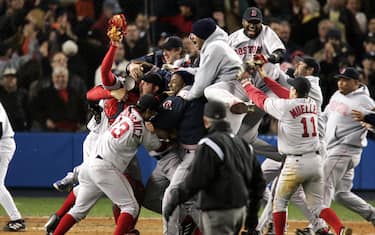 UNITED STATES - OCTOBER 21:  It's bedlam - but a happy kind - as Boston Red Sox players explode with joy after their 10-3 victory over the New York Yankees in Game 7 of the American League Championship Series at Yankee Stadium. In an astounding comeback, the Bosox became the first team in baseball history to win a best-of-seven series after losing the first three games. Now, they go on to the World Series.  (Photo by Corey Sipkin/NY Daily News Archive via Getty Images)