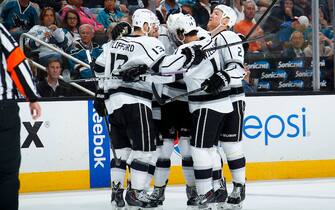 SAN JOSE, CA - APRIL 30: Anze Kopitar #11 of the Los Angeles Kings celebrates with teammates after scoring a goal against the San Jose Sharks in Game Seven of the First Round of the 2014 NHL Stanley Cup Playoffs at SAP Center on April 30, 2014 in San Jose, California. (Photo by Rocky Widner/Getty Images) *** Local Caption *** Anze Kopitar