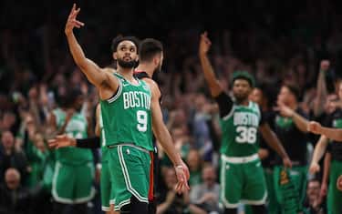 BOSTON, MASSACHUSETTS - MAY 25: Derrick White #9 of the Boston Celtics reacts to a three point basket during the first quarter \M in game five of the Eastern Conference Finals at TD Garden on May 25, 2023 in Boston, Massachusetts. NOTE TO USER: User expressly acknowledges and agrees that, by downloading and or using this photograph, User is consenting to the terms and conditions of the Getty Images License Agreement. (Photo by Maddie Meyer/Getty Images)