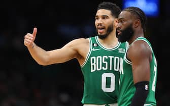 BOSTON, MASSACHUSETTS - MAY 25: Jayson Tatum #0 talks with Jaylen Brown #7 of the Boston Celtics against the Miami Heat during the fourth quarter in game five of the Eastern Conference Finals at TD Garden on May 25, 2023 in Boston, Massachusetts. NOTE TO USER: User expressly acknowledges and agrees that, by downloading and or using this photograph, User is consenting to the terms and conditions of the Getty Images License Agreement. (Photo by Maddie Meyer/Getty Images)