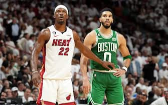 MIAMI, FL - MAY 23: Jimmy Butler #22 of the Miami Heat and Jayson Tatum #0 of the Boston Celtics look on during Game 4 of the 2023 NBA Playoffs Eastern Conference Finals on May 23, 2023 at Miami-Dade Arena in Miami, Florida. NOTE TO USER: User expressly acknowledges and agrees that, by downloading and or using this Photograph, user is consenting to the terms and conditions of the Getty Images License Agreement. Mandatory Copyright Notice: Copyright 2023 NBAE (Photo by Jesse D. Garrabrant/NBAE via Getty Images)