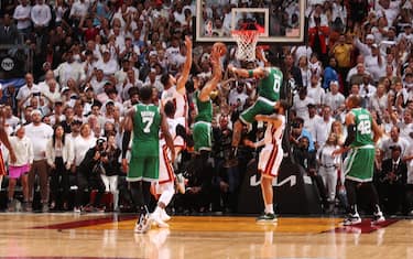 MIAMI, FL - MAY 27: Derrick White #9 of the Boston Celtics shoots the game winner during round 3 game 6 of the Eastern Conference finals 2023 NBA Playoffs against the Miami Heat on May 27, 2023 at Kaseya Center in Miami, Florida. NOTE TO USER: User expressly acknowledges and agrees that, by downloading and or using this Photograph, user is consenting to the terms and conditions of the Getty Images License Agreement. Mandatory Copyright Notice: Copyright 2023 NBAE (Photo by Issac Baldizon/NBAE via Getty Images)