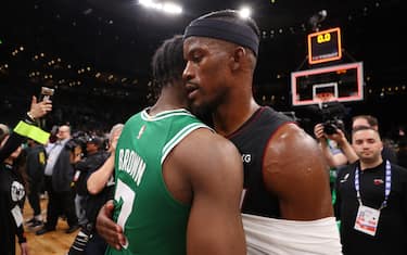 BOSTON, MASSACHUSETTS - MAY 29: Jimmy Butler #22 of the Miami Heat greets Jaylen Brown #7 of the Boston Celtics after the Heat defeated the Celtics 103-84in game seven of the Eastern Conference Finals at TD Garden on May 29, 2023 in Boston, Massachusetts. NOTE TO USER: User expressly acknowledges and agrees that, by downloading and or using this photograph, User is consenting to the terms and conditions of the Getty Images License Agreement. (Photo by Maddie Meyer/Getty Images)