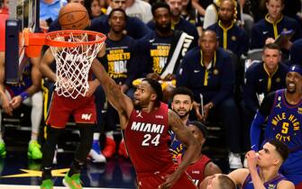 DENVER, CO - JUNE 01: Haywood Highsmith (24) of the Miami Heat scores on a lay up against Nikola Jokic (15) of the Denver Nuggets and Michael Porter Jr. (1) in the third quarter during game one of the NBA Finals at Ball Arena June 01, 2023. (Photo by Andy Cross/The Denver Post)
