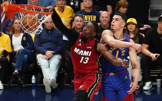 DENVER, COLORADO - JUNE 01: Bam Adebayo #13 of the Miami Heat dunks against Michael Porter Jr. #1 of the Denver Nuggets during the first quarter in Game One of the 2023 NBA Finals at Ball Arena on June 01, 2023 in Denver, Colorado. NOTE TO USER: User expressly acknowledges and agrees that, by downloading and or using this photograph, User is consenting to the terms and conditions of the Getty Images License Agreement. (Photo by Jamie Schwaberow/Getty Images)