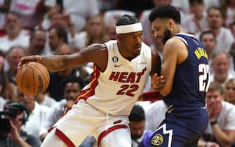 MIAMI, FLORIDA - JUNE 09: Jimmy Butler #22 of the Miami Heat dribbles against Jamal Murray #27 of the Denver Nuggets during the first quarter in Game Four of the 2023 NBA Finals at Kaseya Center on June 09, 2023 in Miami, Florida. NOTE TO USER: User expressly acknowledges and agrees that, by downloading and or using this photograph, User is consenting to the terms and conditions of the Getty Images License Agreement. (Photo by Mike Ehrmann/Getty Images)