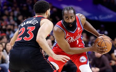 PHILADELPHIA, PENNSYLVANIA - APRIL 18: James Harden #1 of the Philadelphia 76ers looks on past Fred VanVleet #23 of the Toronto Raptors during Game Two of the Eastern Conference First Round at Wells Fargo Center on April 18, 2022 in Philadelphia, Pennsylvania. NOTE TO USER: User expressly acknowledges and agrees that, by downloading and or using this photograph, User is consenting to the terms and conditions of the Getty Images License Agreement. (Photo by Tim Nwachukwu/Getty Images)