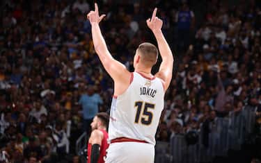 DENVER, CO - JUNE 12: Nikola Jokic #15 of the Denver Nuggets celebrates during the game against the Miami Heat during Game Five of the 2023 NBA Finals on June 12, 2023 at Ball Arena in Denver, Colorado. NOTE TO USER: User expressly acknowledges and agrees that, by downloading and or using this Photograph, user is consenting to the terms and conditions of the Getty Images License Agreement. Mandatory Copyright Notice: Copyright 2023 NBAE (Photo by Nathaniel S. Butler/NBAE via Getty Images)