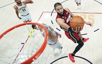 DENVER, COLORADO - JUNE 12: Caleb Martin #16 of the Miami Heat drives to the basket during the fourth quarter against the Denver Nuggets in Game Five of the 2023 NBA Finals at Ball Arena on June 12, 2023 in Denver, Colorado. NOTE TO USER: User expressly acknowledges and agrees that, by downloading and or using this photograph, User is consenting to the terms and conditions of the Getty Images License Agreement. (Photo by Jack Dempsey - Pool/Getty Images)