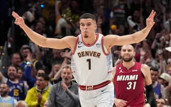 DENVER, CO - JUNE 12: Michael Porter Jr. #1 of the Denver Nuggets celebrates a play during Game Five of the 2023 NBA Finals on June 12, 2023 at Ball Arena in Denver, Colorado. NOTE TO USER: User expressly acknowledges and agrees that, by downloading and or using this Photograph, user is consenting to the terms and conditions of the Getty Images License Agreement. Mandatory Copyright Notice: Copyright 2023 NBAE (Photo by Jesse D. Garrabrant/NBAE via Getty Images)