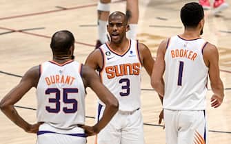 DENVER, CO - MAY 1: Chris Paul (3) of the Phoenix Suns speaks with Kevin Durant (35) and Devin Booker (1) after Durant picked up a foul during the second quarter against the Denver Nuggets at Ball Arena in Denver on Monday, May 1, 2023. (Photo by AAron Ontiveroz/MediaNews Group/The Denver Post via Getty Images)