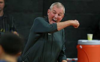 Franklin, MA 11-20-18: Jim Calhoun, the head coach of the St. Joseph's Blue Jays Division Three men's basketball team is pictured during yelling from the bench during the club's first ever road game vs. Dean College played at the Pieri Gymnasium. (Jim Davis/Globe Staff)