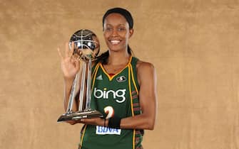 ATLANTA - SEPTEMBER 16: Swin Cash #2 of the Seattle Storm poses with the WNBA Championship  Trophy after defeating the Atlanta Dream in Game Three of the 2010 WNBA Finals on September 16, 2010 at Philips Arena in Atlanta, Georgia. NOTE TO USER: User expressly acknowledges and agrees that, by downloading and/or using this Photograph, user is consenting to the terms and conditions of the Getty Images License Agreement. Mandatory Copyright Notice: Copyright 2010 NBAE (Photo by Jesse D. Garrabrant/NBAE via Getty Images) 