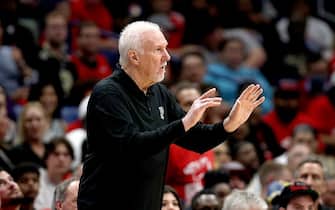 NEW ORLEANS, LOUISIANA - APRIL 13: Gregg Popovich head coach of the San Antonio Spurs looks on during the first quarter of the 2022 NBA Play-In Tournament against the New Orleans Pelicans at Smoothie King Center on April 13, 2022 in New Orleans, Louisiana. NOTE TO USER: User expressly acknowledges and agrees that, by downloading and or using this photograph, User is consenting to the terms and conditions of the Getty Images License Agreement. (Photo by Sean Gardner/Getty Images)