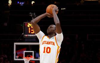 ATLANTA, GA - MARCH 31: Gorgui Dieng #10 of the Atlanta Hawks shoots during the second half against the Cleveland Cavaliers at State Farm Arena on December 19, 2021 in Atlanta, Georgia. NOTE TO USER: User expressly acknowledges and agrees that, by downloading and or using this photograph, User is consenting to the terms and conditions of the Getty Images License Agreement. (Photo by Todd Kirkland/Getty Images) *** Local Caption *** Gorgui Dieng