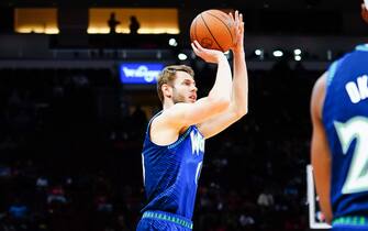 HOUSTON, TX - JANUARY 09: Jake Layman #10 of the Minnesota Timberwolves shoots a three point shot during the game against the Houston Rockets at Toyota Center on January 9, 2022 in Houston, Texas. NOTE TO USER: User expressly acknowledges and agrees that, by downloading and/or using this Photograph, user is consenting to the terms and conditions of the Getty Images License Agreement (Photo by Alex Bierens de Haan/Getty Images)