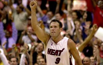 Dan Majerle of the Miami Heat celebrates sinking a three-point jump shot late against the New York Knicks in their fifth Eastern Conference Semifinals Series game at the American Airlines Arena in Miami 17 May 00. The Heat beat the Knicks 87-81 and lead the best-of-seven series 3-2.    ELECTRONIC IMAGE      AFP PHOTO      ROBERTO SCHMIDT (Photo by Roberto SCHMIDT / AFP) (Photo by ROBERTO SCHMIDT/AFP via Getty Images)