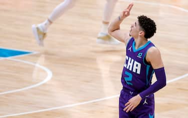 CHARLOTTE, NORTH CAROLINA - JANUARY 09: LaMelo Ball #2 of the Charlotte Hornets reacts following a three point basket during the second quarter of their game against the Atlanta Hawks at Spectrum Center on January 09, 2021 in Charlotte, North Carolina. NOTE TO USER: User expressly acknowledges and agrees that, by downloading and or using this photograph, User is consenting to the terms and conditions of the Getty Images License Agreement. (Photo by Jared C. Tilton/Getty Images)