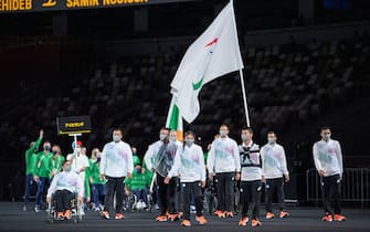 Handout photo dated 24/08/2021 provided by OIS of Abbas Karimi and Alia Issa the flag bearers for the Refugee Paralympic Team during the Parade of Athletes during the opening ceremony of the Tokyo 2020 Paralympic Games at Olympic Stadium in Japan. Picture date: Tuesday August 24, 2021.