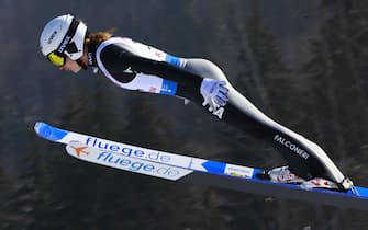 epa09023719 Jessica Malsiner of Italy is airborne during the Women's HS97 competition at the FIS Ski Jumping World Cup in Rasnov, Romania, 19 February 2021.  EPA/ROBERT GHEMENT