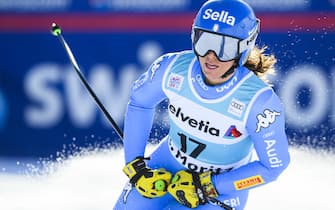 epa09637829 Elena Curtoni of Italy reacts in the finish area during the women's Super-G race at the FIS Alpine Skiing World Cup event in St. Moritz, Switzerland, 12 December 2021.  EPA/PETER SCHNEIDER