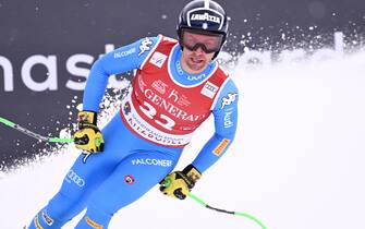 epa09699569 Matteo Marsaglia of Italy reacts in the finish area during the men's Downhill race of the FIS Alpine Skiing World Cup event in Kitzbuehel, Austria, 21 January 2022.  EPA/CHRISTIAN BRUNA