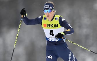 epa08070514 Lucia Scardoni of Italy in action during the sprint qualification run at the Davos Nordic FIS Cross Country World Cup in  Davos, Switzerland, 14 December 2019.  EPA/GIAN EHRENZELLER