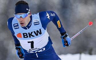 epa08878715 Maicol Rastelli of Italy in action during the sprint qualification at the FIS Cross Country Skiing World Cup event in Davos, Switzerland, 12 December 2020.  EPA/GIAN EHRENZELLER