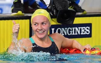 epa06656720 Ariarne Titmus of Australia reacts after winning the Women's 800m Freestyle Final of the XXI Commonwealth Games at Gold Coast Aquatic Centre on the Gold Coast, Australia, 09 April 2018.  EPA/DARREN ENGLAND  AUSTRALIA AND NEW ZEALAND OUT